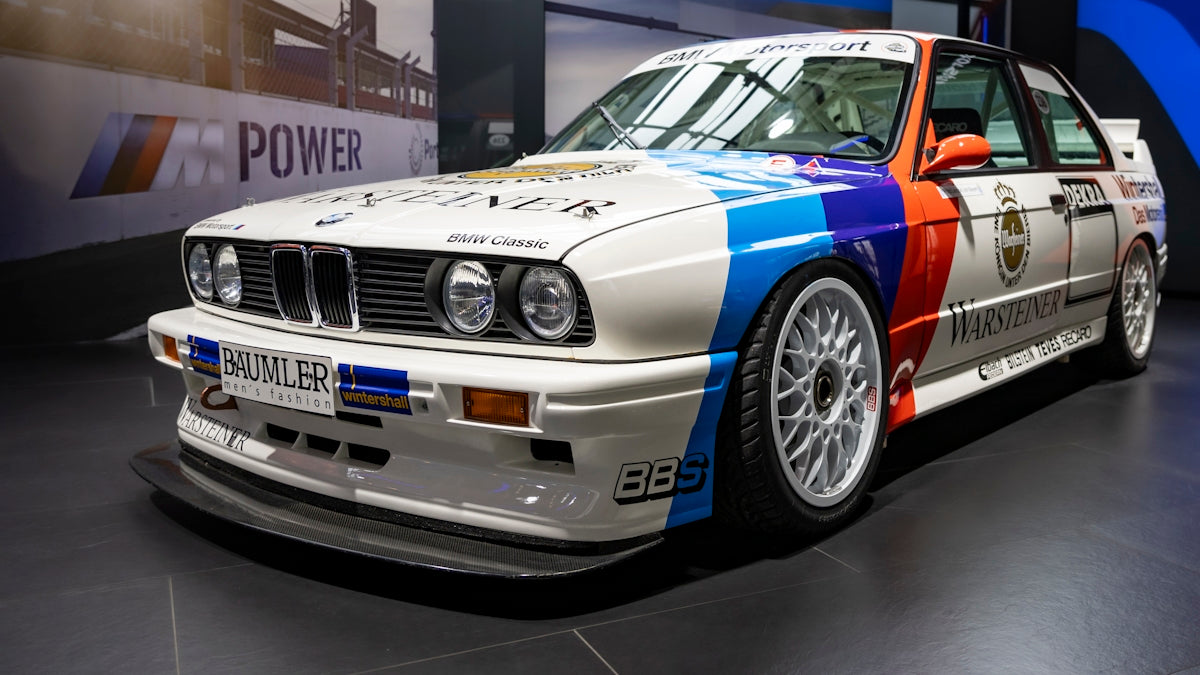 A BMW race car on display in a museum